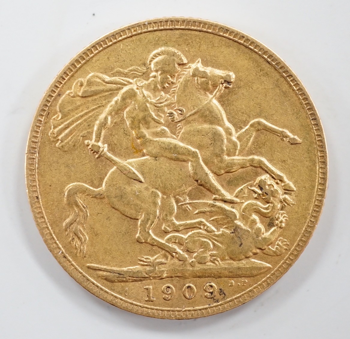An Edward VII 1909 gold sovereign, good F.